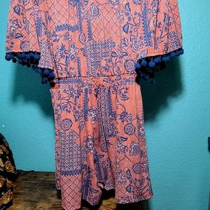 NWOT Catos mauve and deep blue, with pompoms, off the should romper